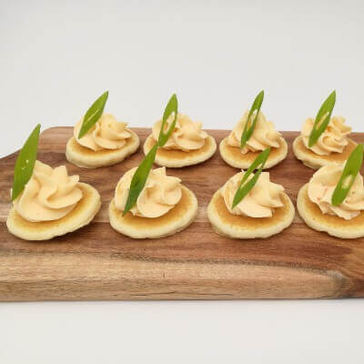 Smoked salmon, cream cheese on blini