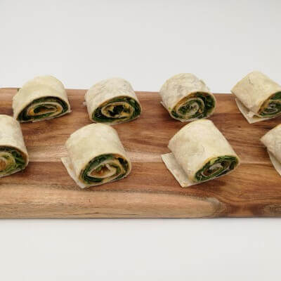 Spinach, tomato relish & hummus pinwheel wrap bite