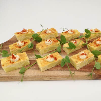Potato and herb cake with sour cream