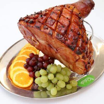 Glazed half ham on bone with homemade glaze and in house Relish